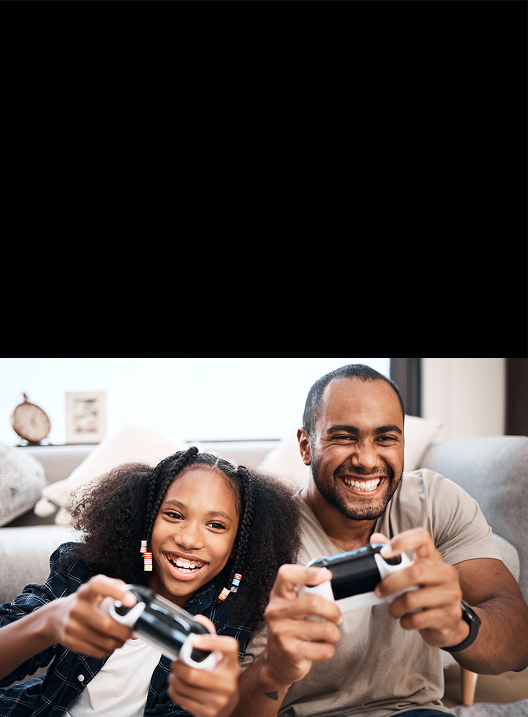Boy and girl playing video games